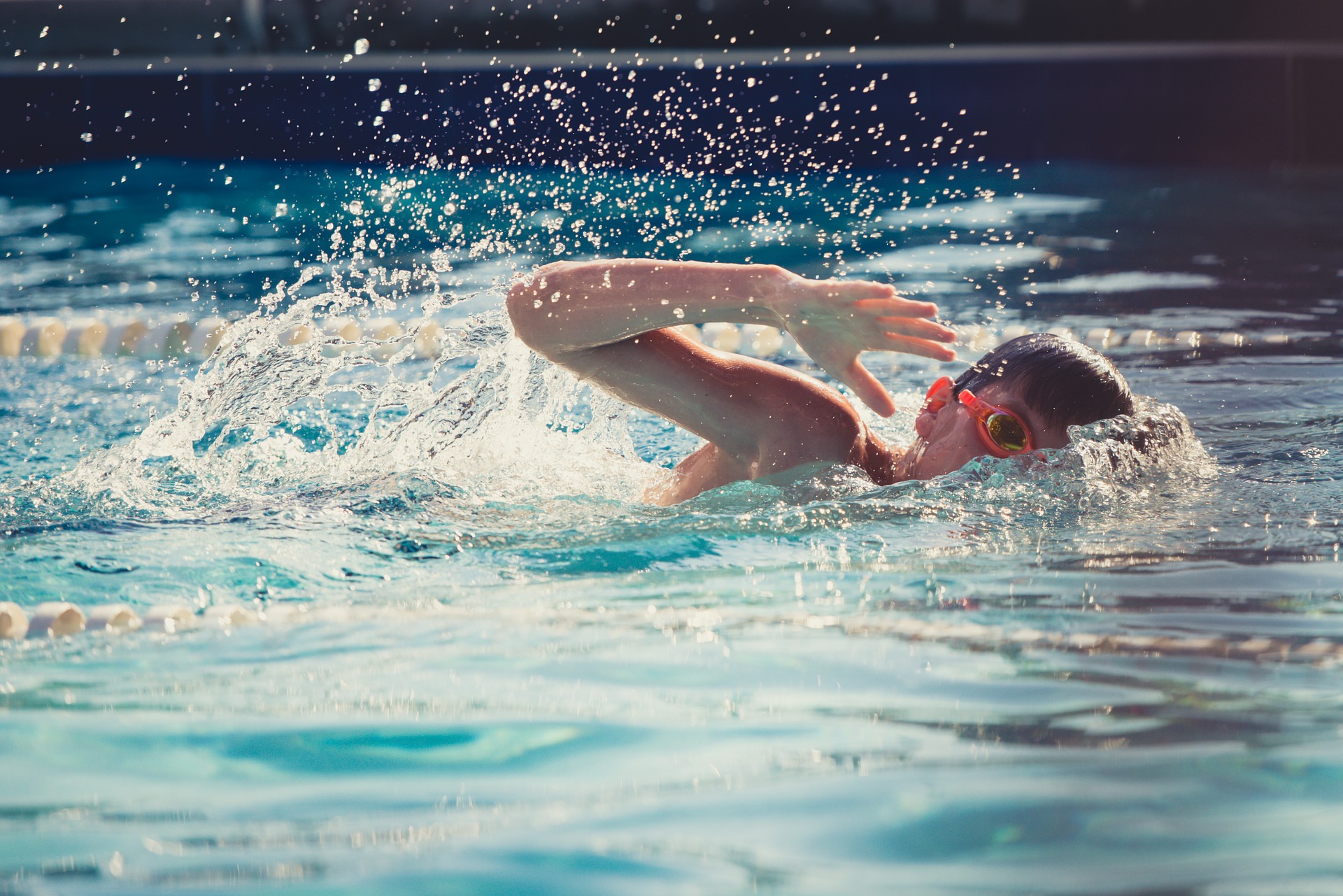 Child swimming in a pool
