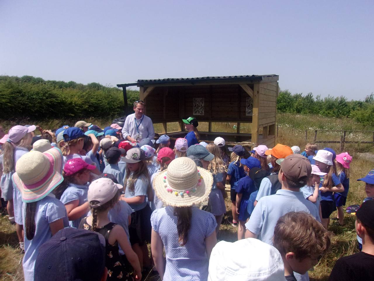 children listening to a talk