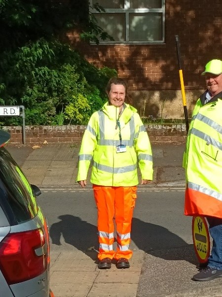 Emma Selway with a lollipop man