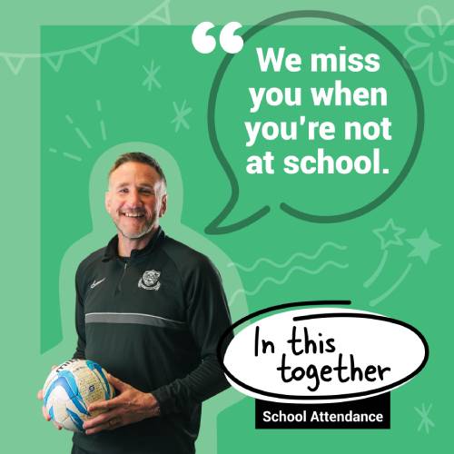 We miss you when you're not in school image of PE teacher holding a football to save